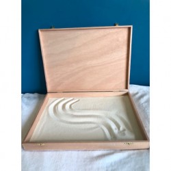 La boîte pour dessiner dans le sable